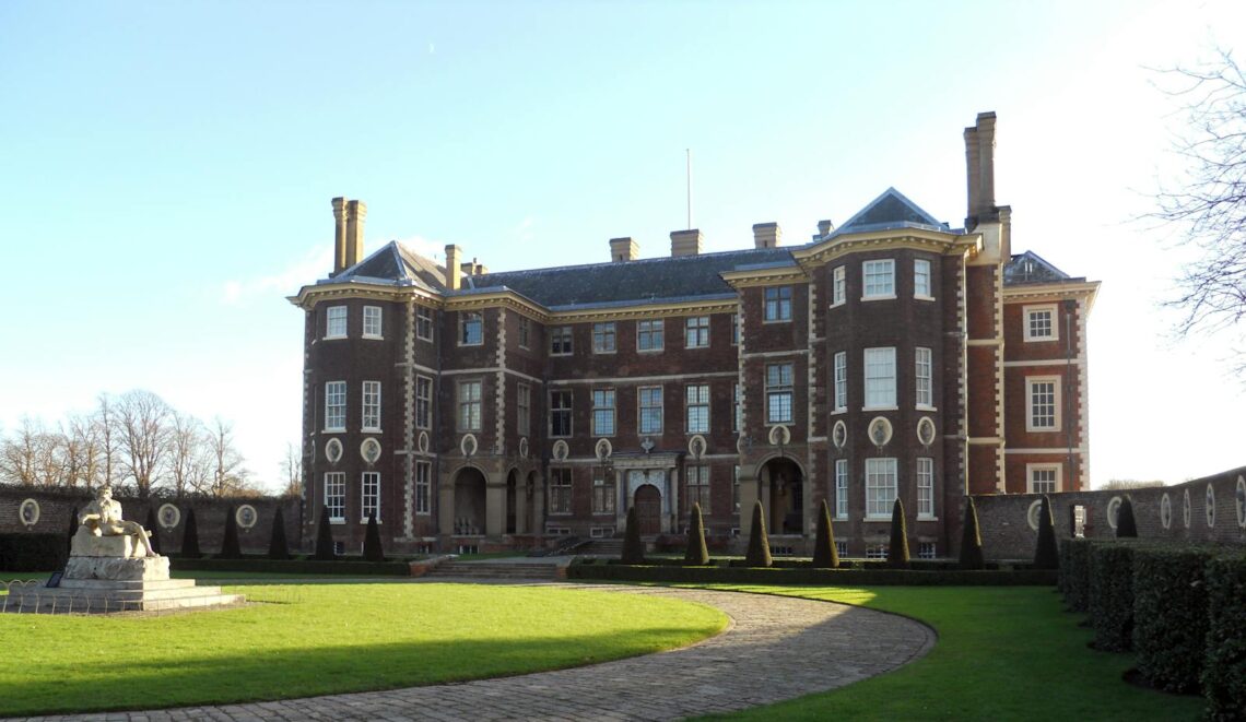 View of the historic Ham House in Surrey, England, with a manicured courtyard.